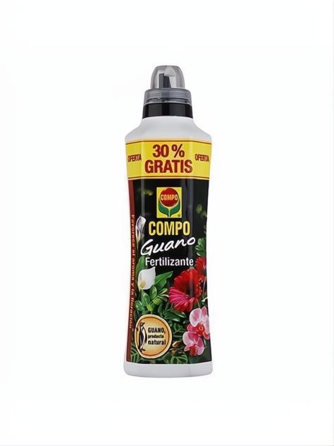 Envase blanco de fertilizante líquido Compo Guano de 1.3L con etiqueta negra, flores y oferta 30% gratis.
