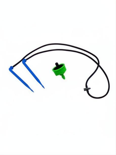 Kit Stopper Gotero 4 L/h with green stopper, black microtubes, and blue stakes for precise irrigation.