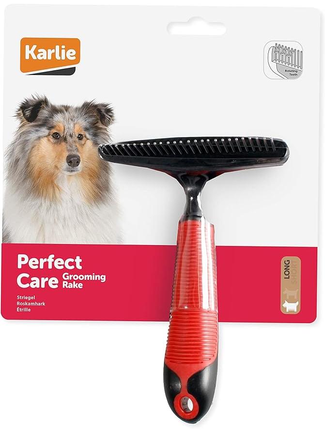 Karlie Perfect Care Grooming Rake with black rotating teeth and red ergonomic handle for dogs.